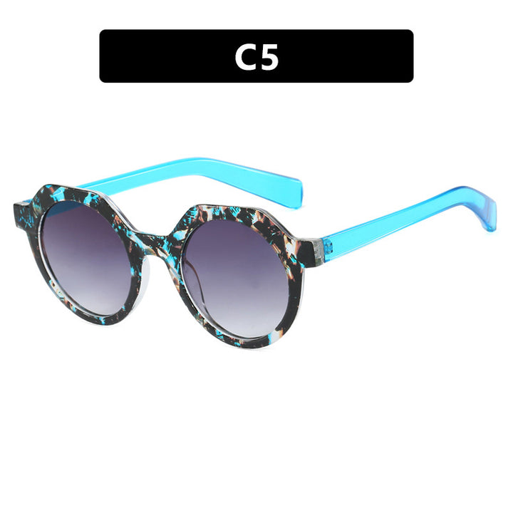 Ladies extravagant round sunglasses with colored accented frame Bowlift