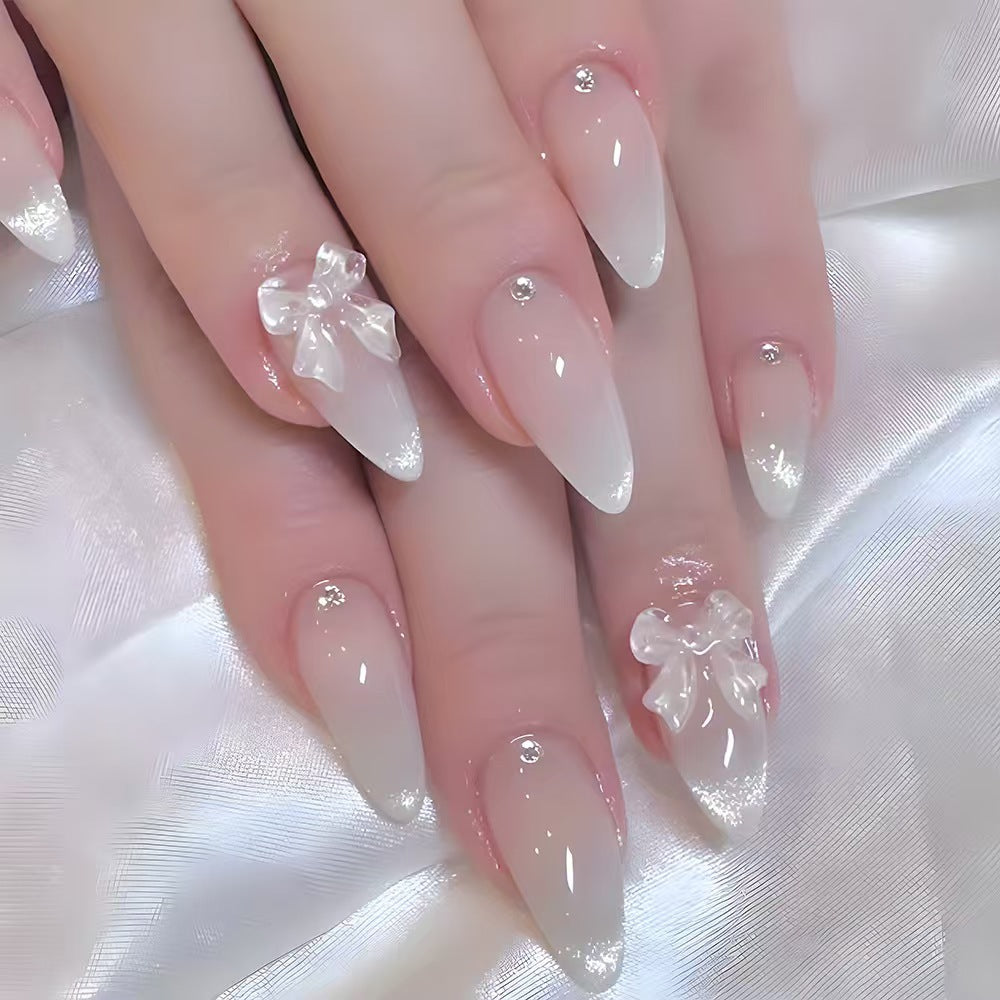Artistic Press-On Nail Set with Celestial Design Bowlift