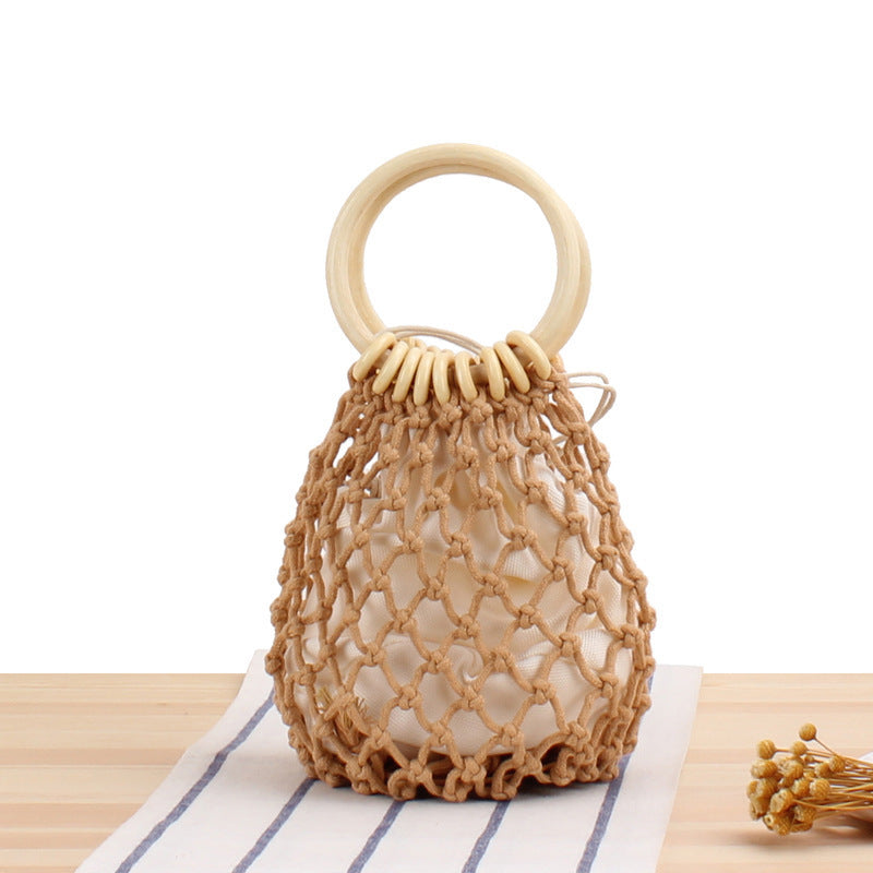 Tote bag with hand-knotted net design and wooden handle Bowlift