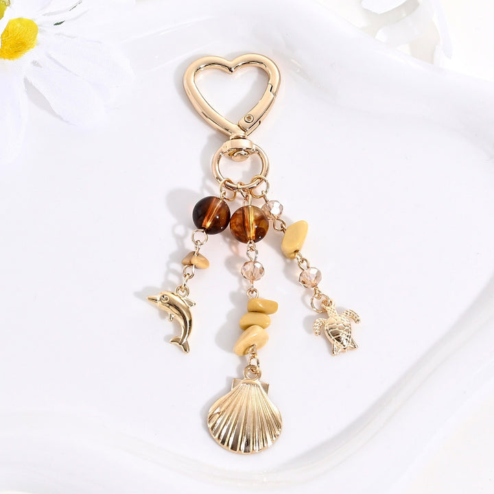 Keychain with Sparkling Sun Motif Bowlift