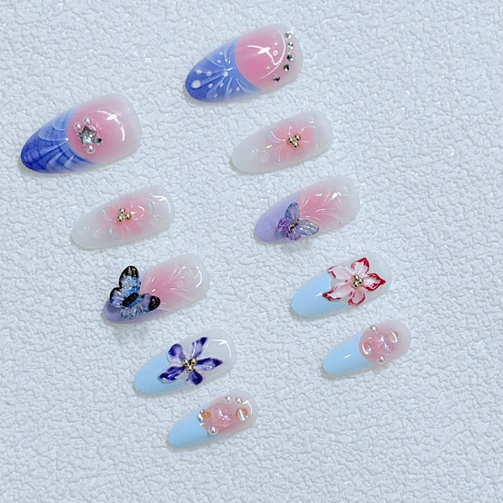 Artful Nail Art with Floral Details and Butterflies Bowlift