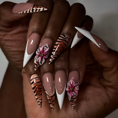 Artful stiletto nails with floral and animal design Bowlift