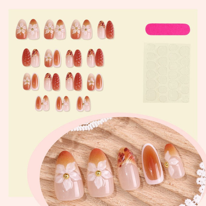 Artificial nail set with handcrafted flowers and elegant embellishments Bowlift