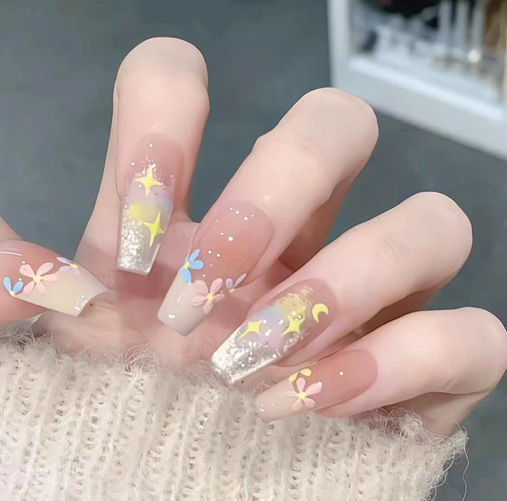 Artificial nails with elegant ombre effect and glitter coating Bowlift
