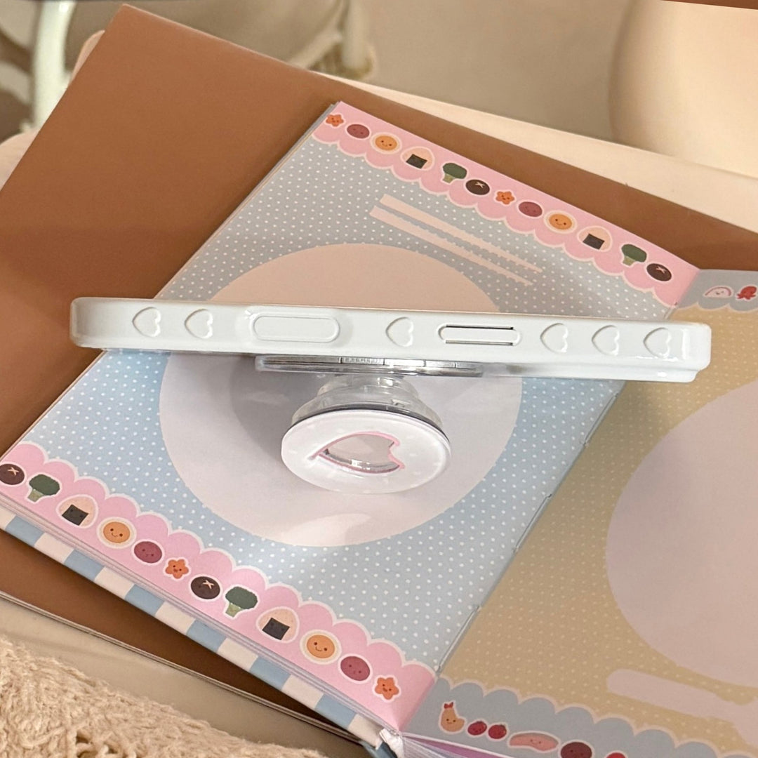 Heart-shaped coaster with playful design Bowlift