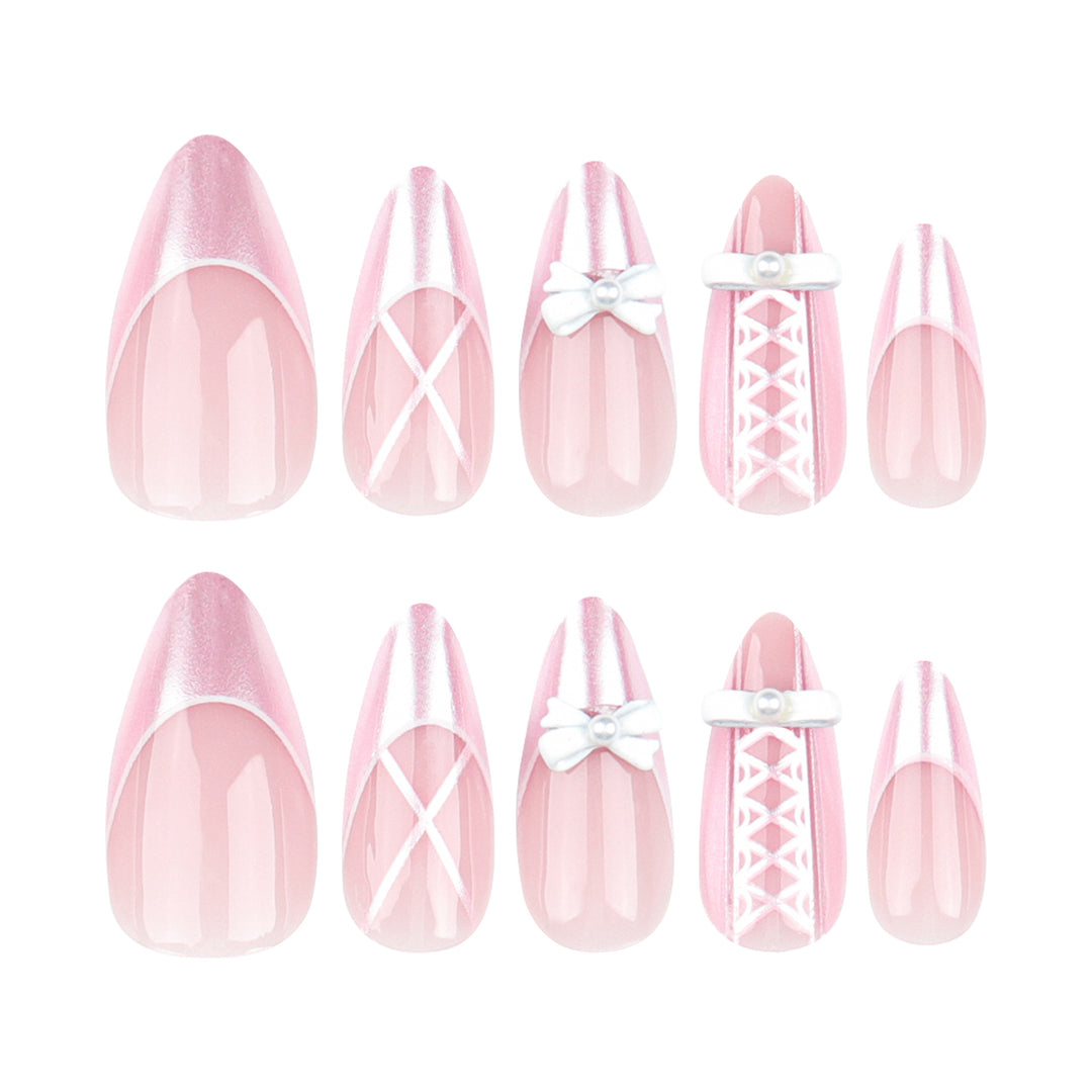 Artistic stiletto nails with elegant pearl and bow accents Bowlift
