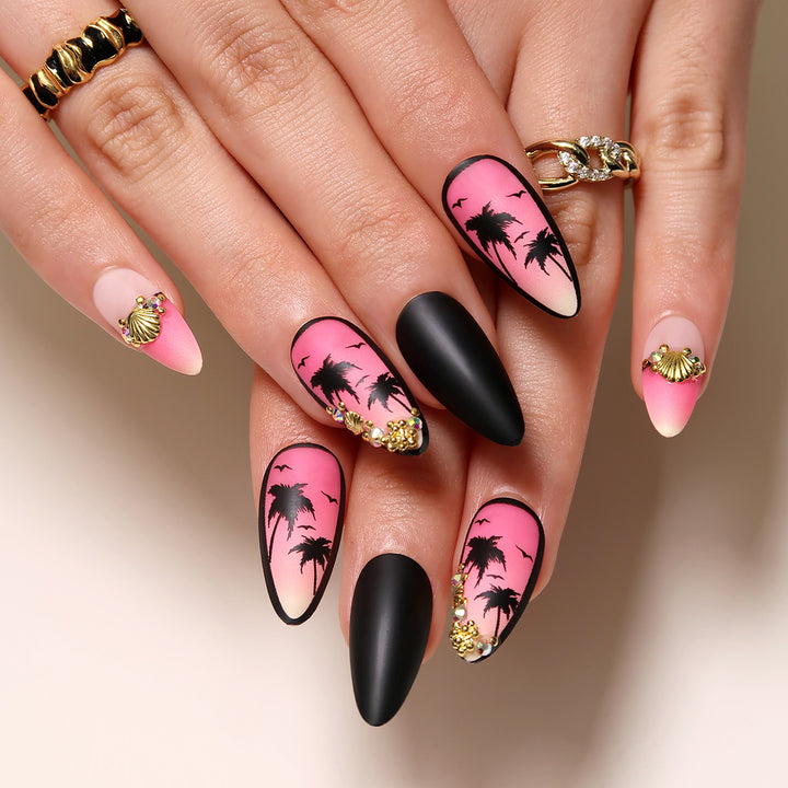 Artful nail art with palm motifs and glitter accents Bowlift