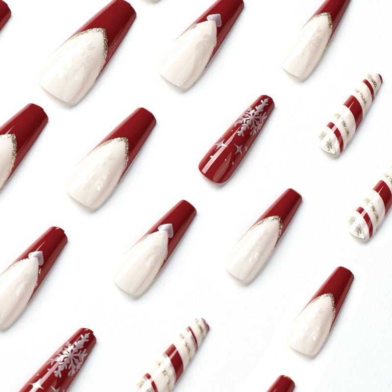 Artful Christmas nail art with festive patterns Bowlift