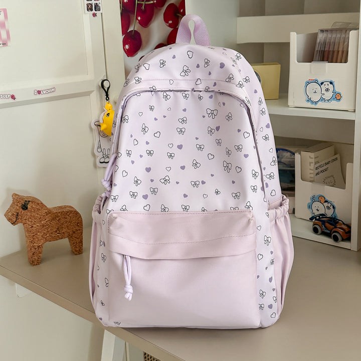 Playful Heart and Bow Patterned Backpack