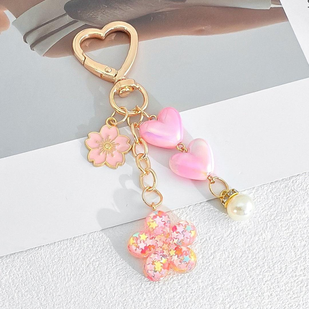 Playful keychain with hearts and flower motif Bowlift