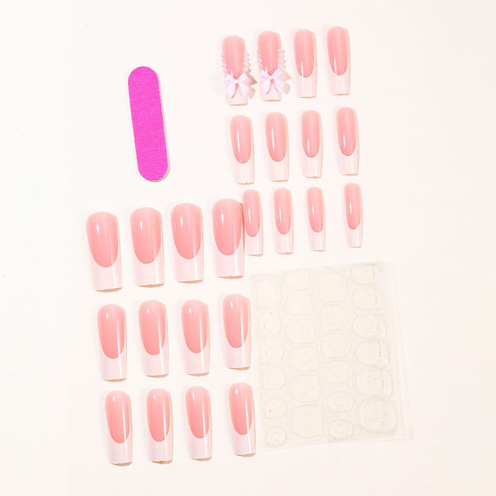 Elegant Stiletto Nail Art Extensions with Pearl and Bow Accents Bowlift