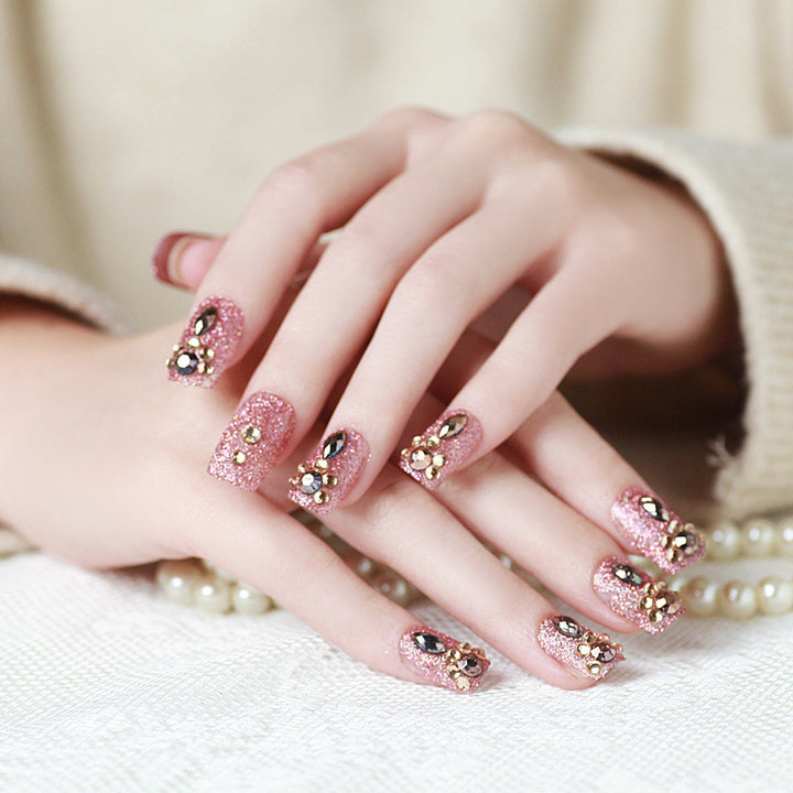 Artificial nails with elegant flower and rhinestone design Bowlift