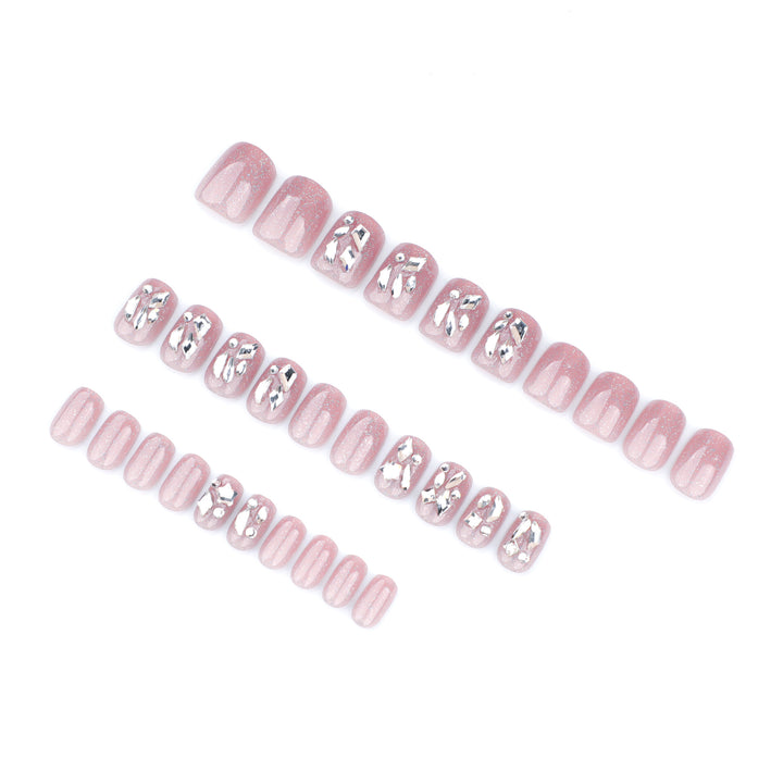 Artificial nail art with glamorous glitter accents Bowlift
