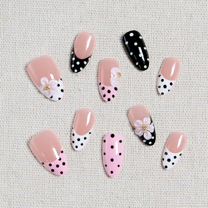 Nail art set with floral accents and elegant dots Bowlift