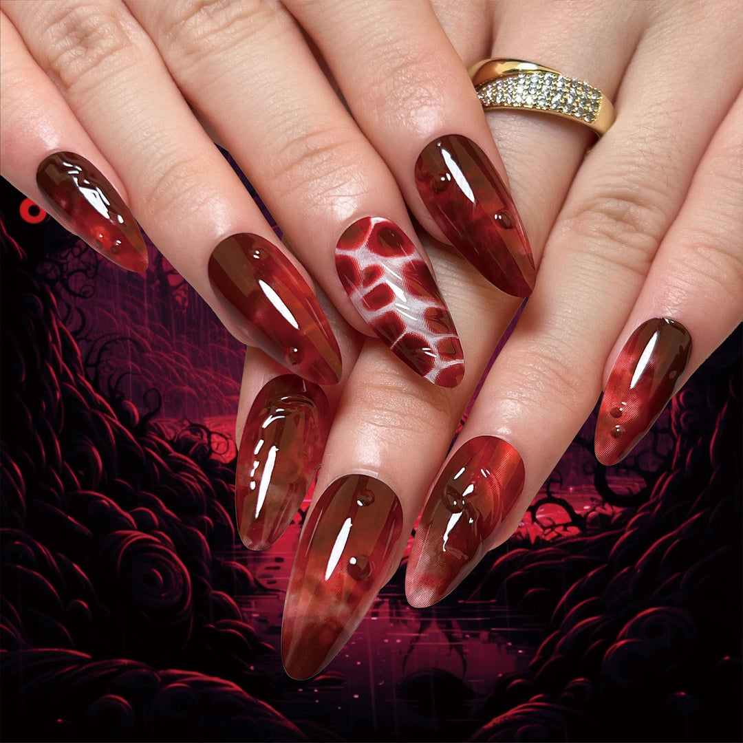 Creative Stiletto Nail Art with Blood Red Accents Bowlift