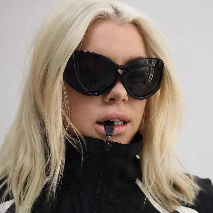 Women striking sunglasses in trendy leopard pattern Bowlift