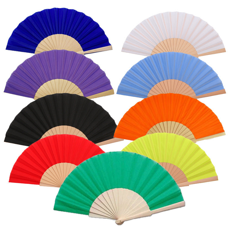 Ladies folding hand fan made of airy material with intricate folds Bowlift