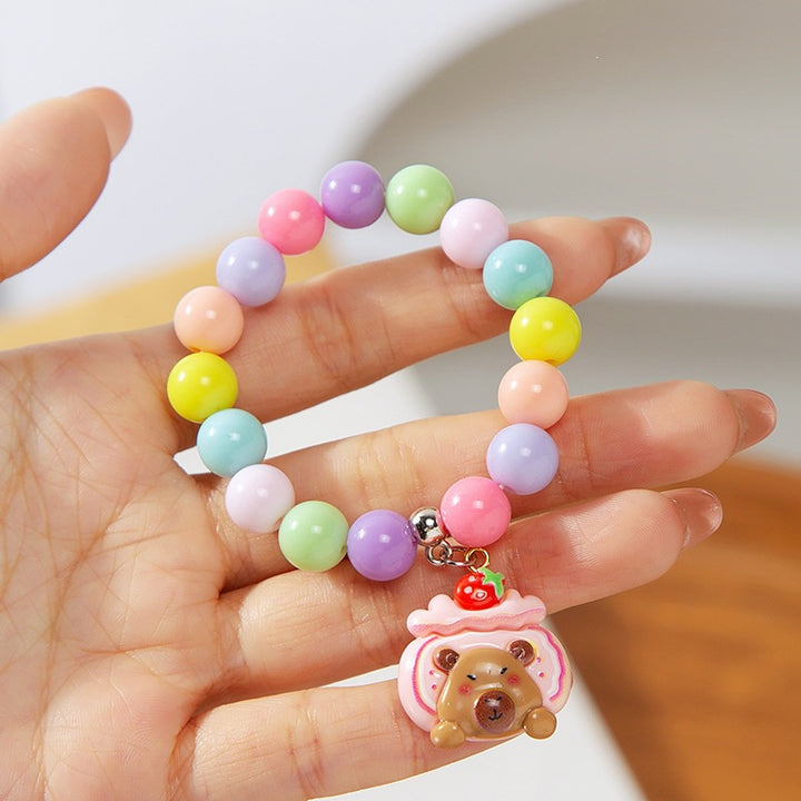 Colorful children's bracelet with crafted pendant Bowlift