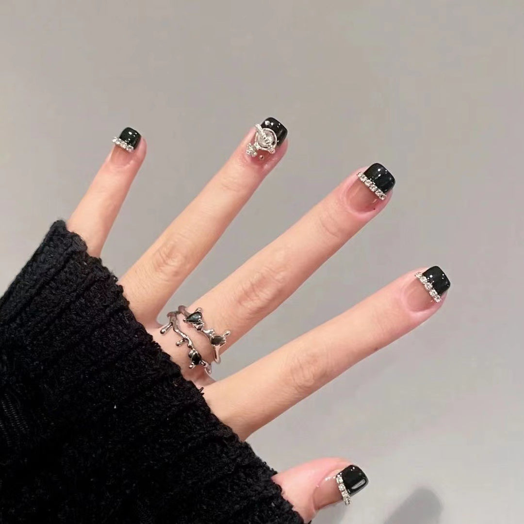 Glamorous nail art with rhinestone embellishments Bowlift