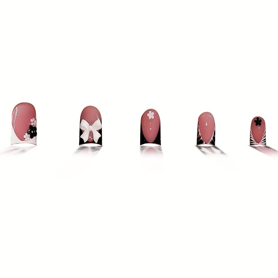 Decorative Press-On Nail Art with Floral and Graphic Designs Bowlift
