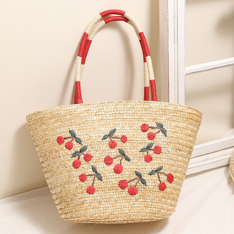 Handcrafted basket bag with vibrant floral embroidery design Bowlift