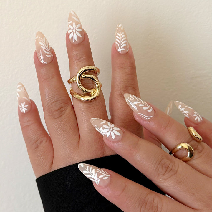 Stiletto nails with floral decorations Bowlift