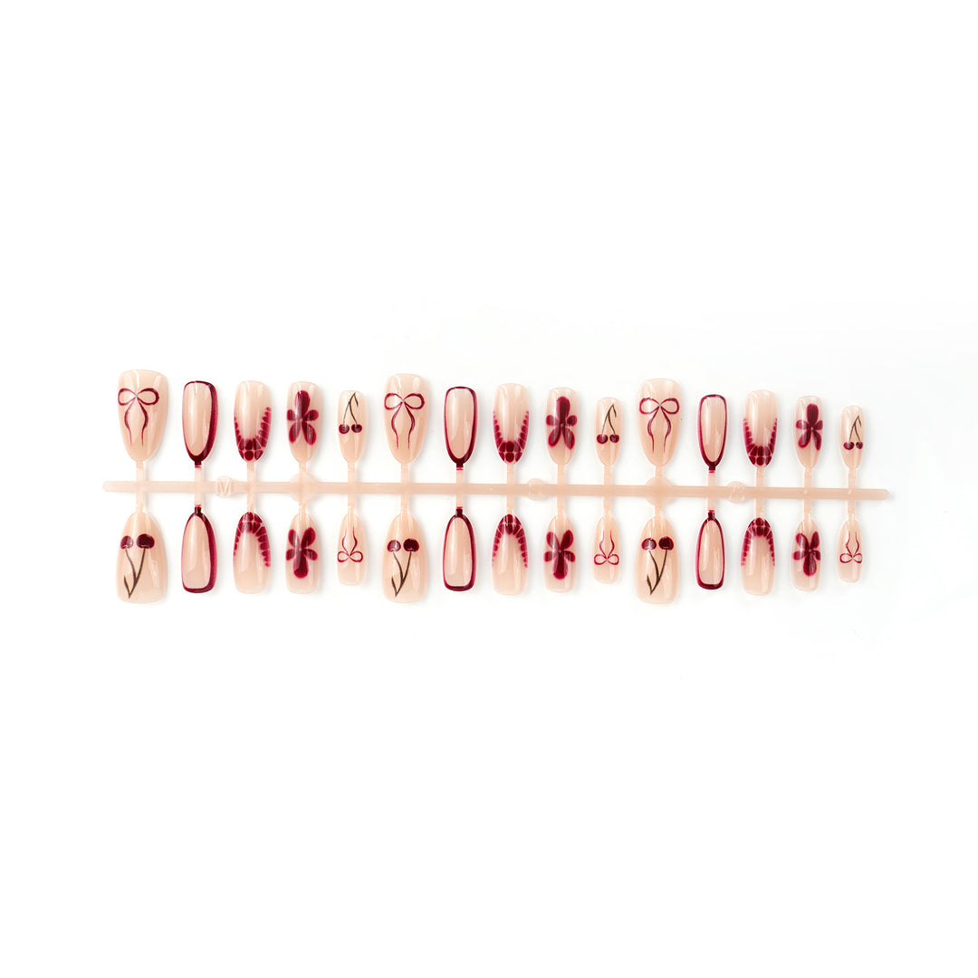 Artificial nails with floral design and elegant accents Bowlift