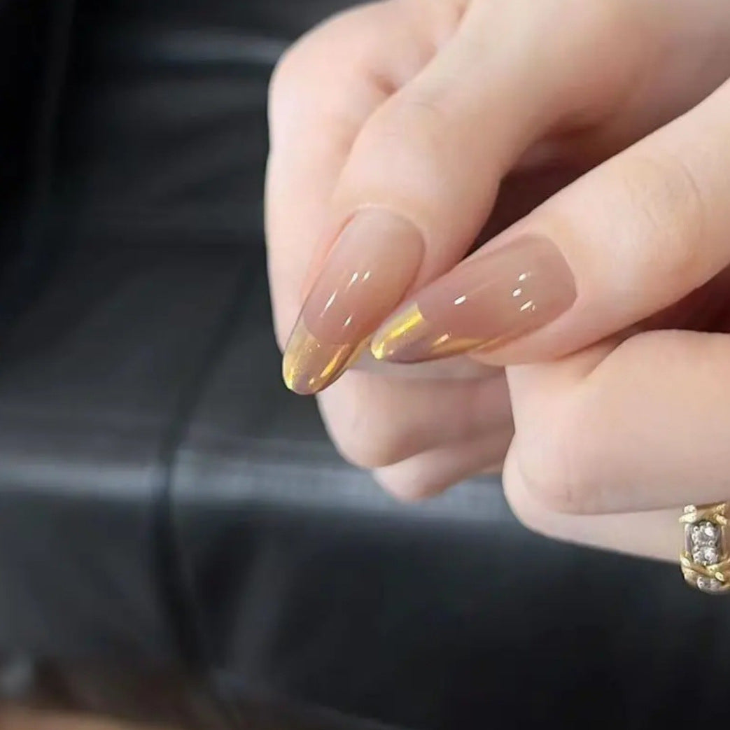 Nail art with elegant gradient and metallic accents Bowlift