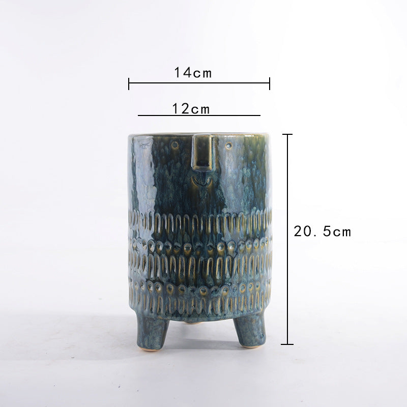 Decorative plant pot with facial features Bowlift