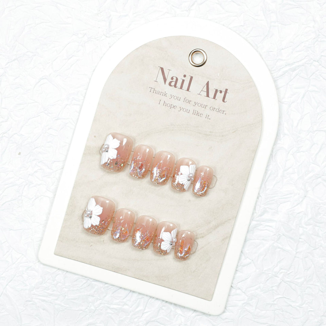 Artistic Floral-Embellished Press-On Nail Design Bowlift