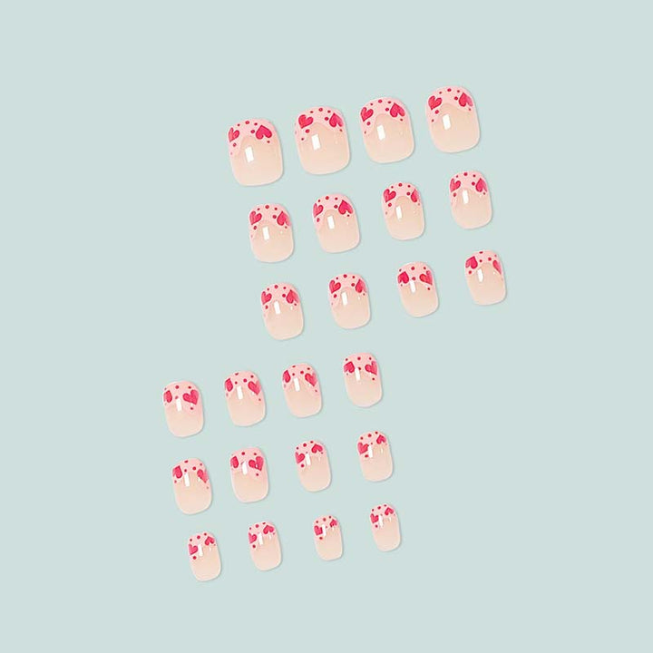 Artfully designed nail tips with heart motifs Bowlift