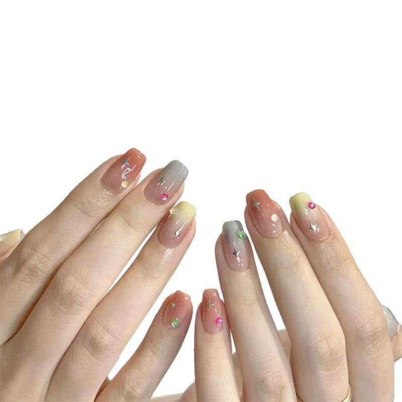 Artificial nails with glitter and heart design Bowlift