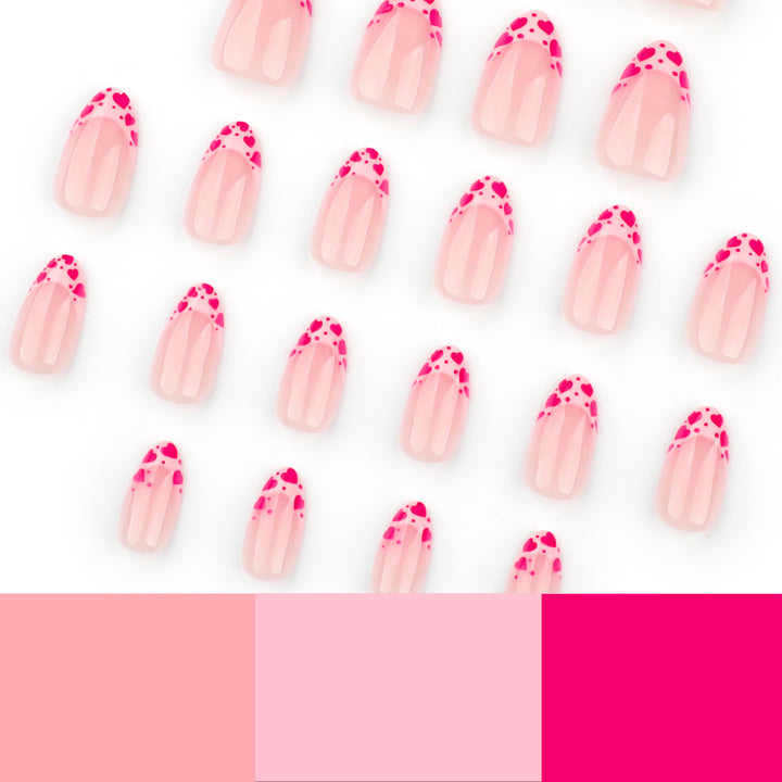 Artificial nail extensions with heart tip accents Bowlift