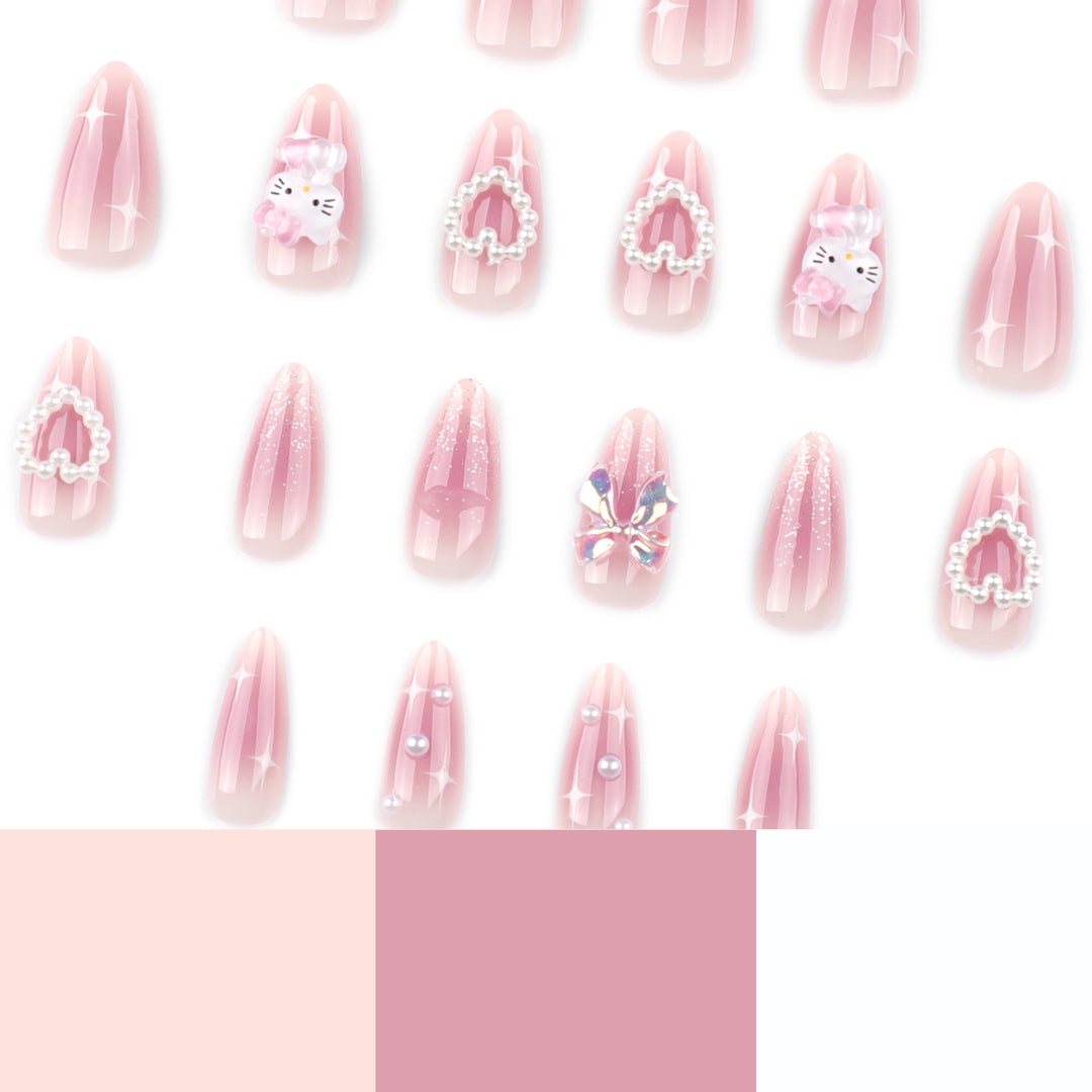 Artificial nail art with playful designs and 3D elements Bowlift