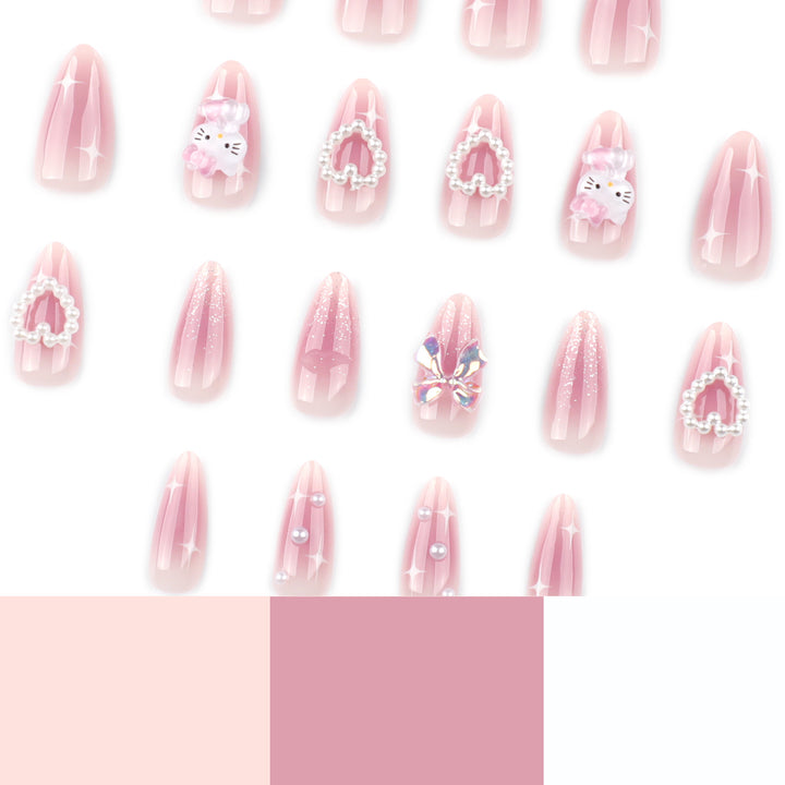 Artificial nail art with playful designs and 3D elements Bowlift