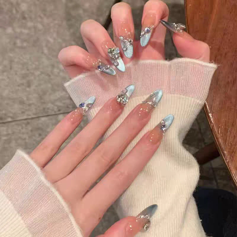 Artifical nails with shiny rhinestone decorations Bowlift