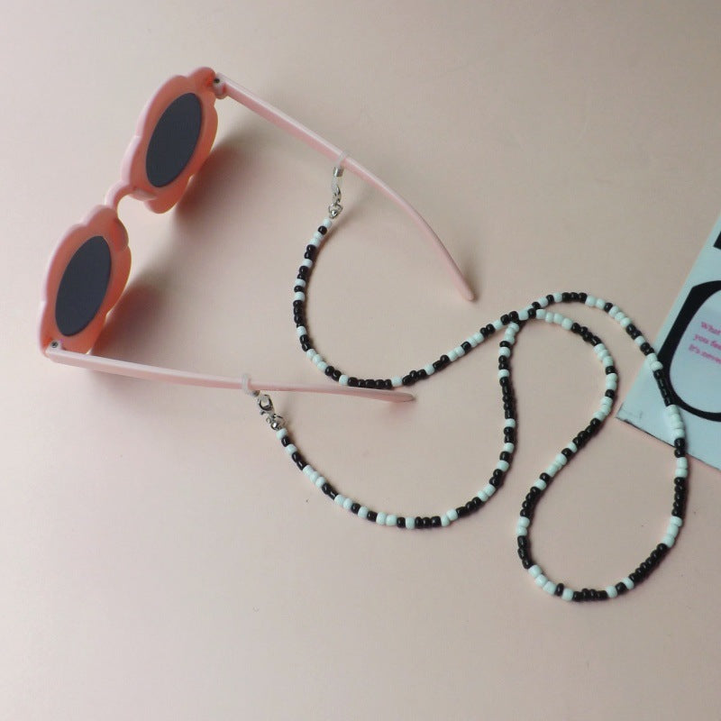 Sunglasses with fashionable pearl band Bowlift