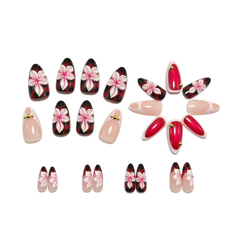 Artificial nails with floral 3D designs and elegant accents Bowlift