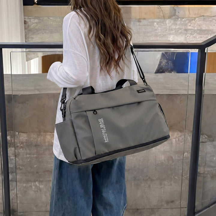 Travel and Sports Bag with Water-Repellent Material and Many Compartments Bowlift
