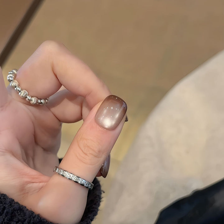 Artificial nails with elegant gradient color and glitter elements Bowlift
