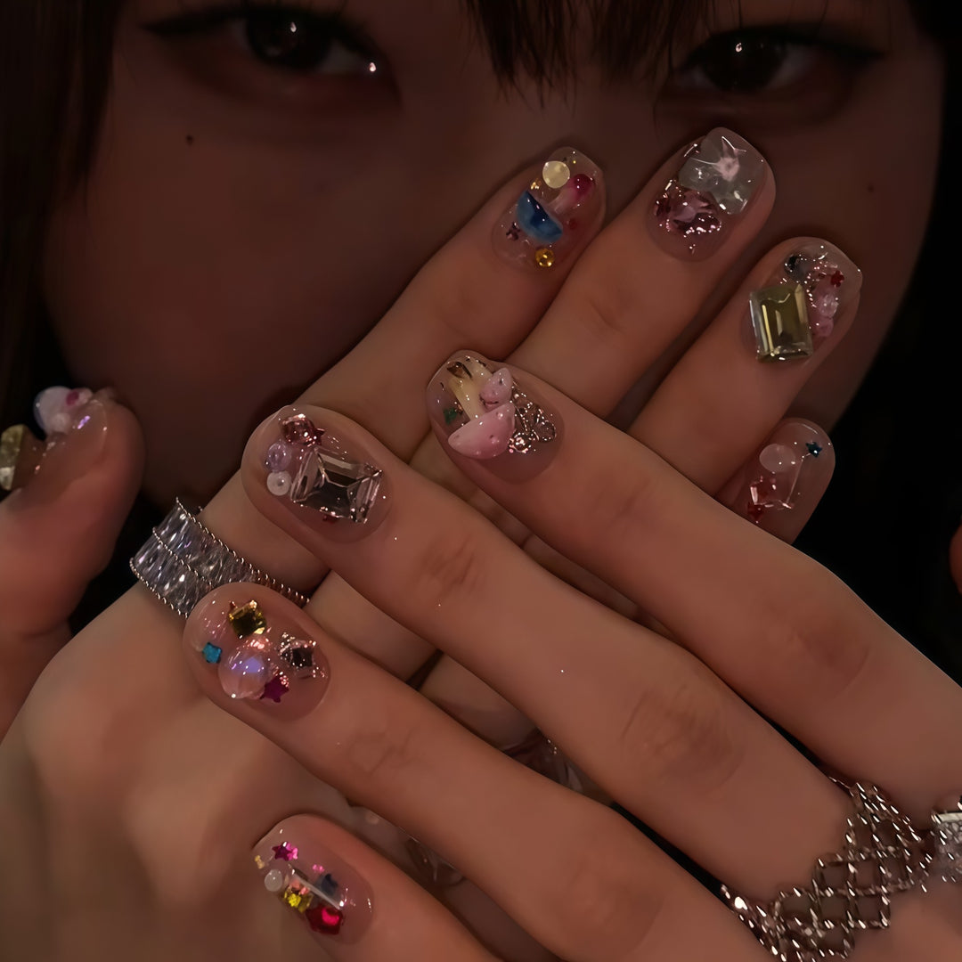 Artificial nails with sparkling crystal accents Bowlift