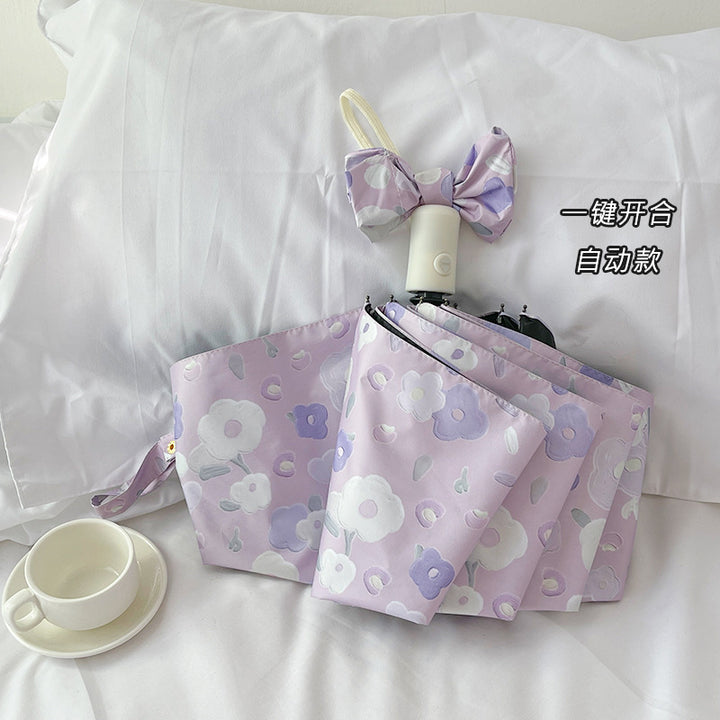 Women's Automatic Folding Umbrella with Floral Design and Practical Storage System Bowlift