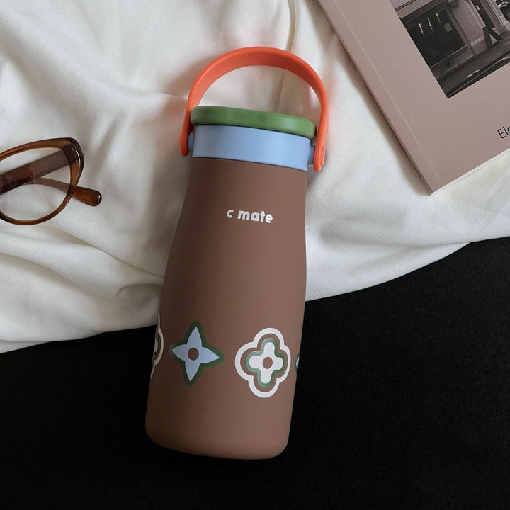 Women's ergonomic water bottle with practical carrying handle Bowlift