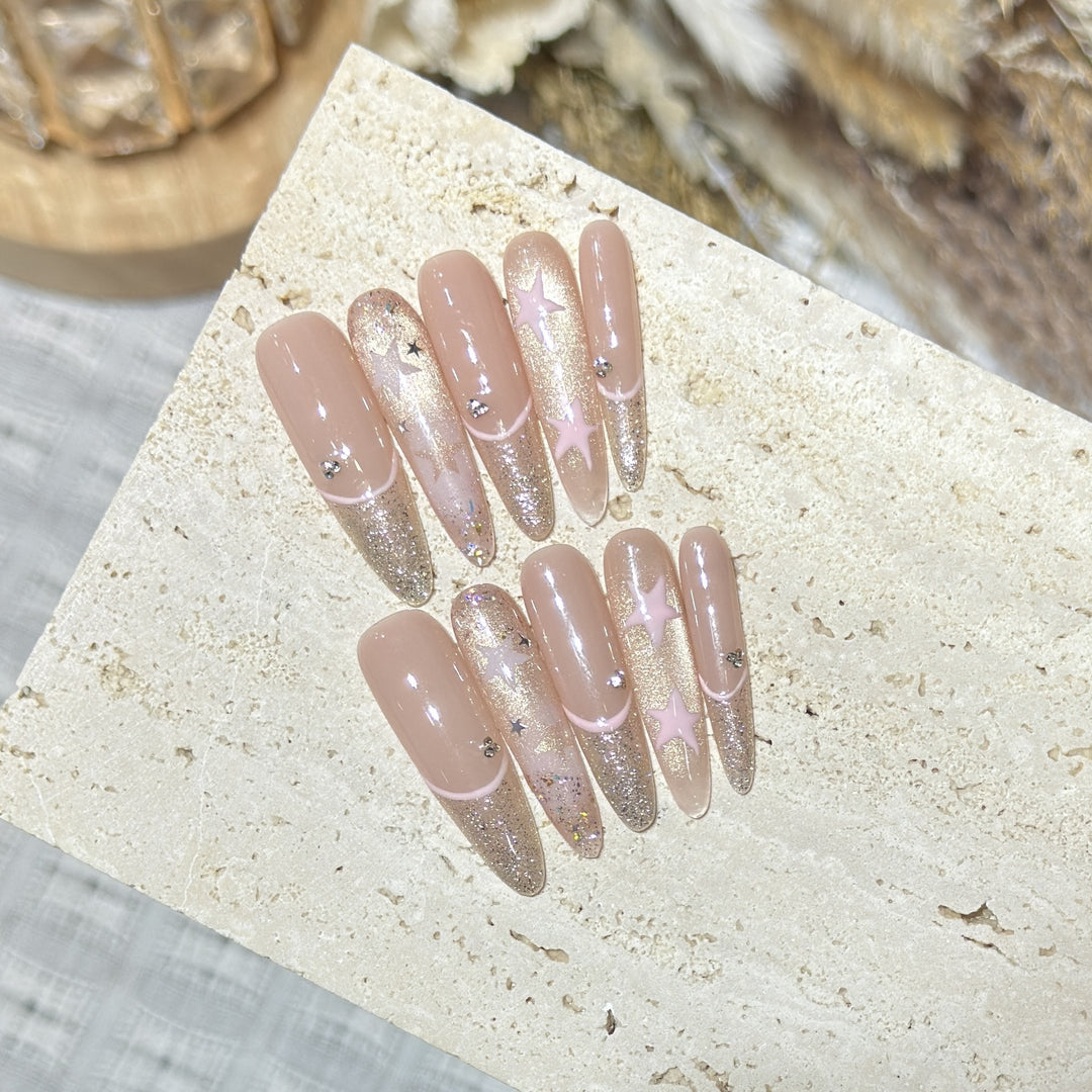 Elegant Stiletto Press-On Nail Art with Rhinestone Accents Bowlift
