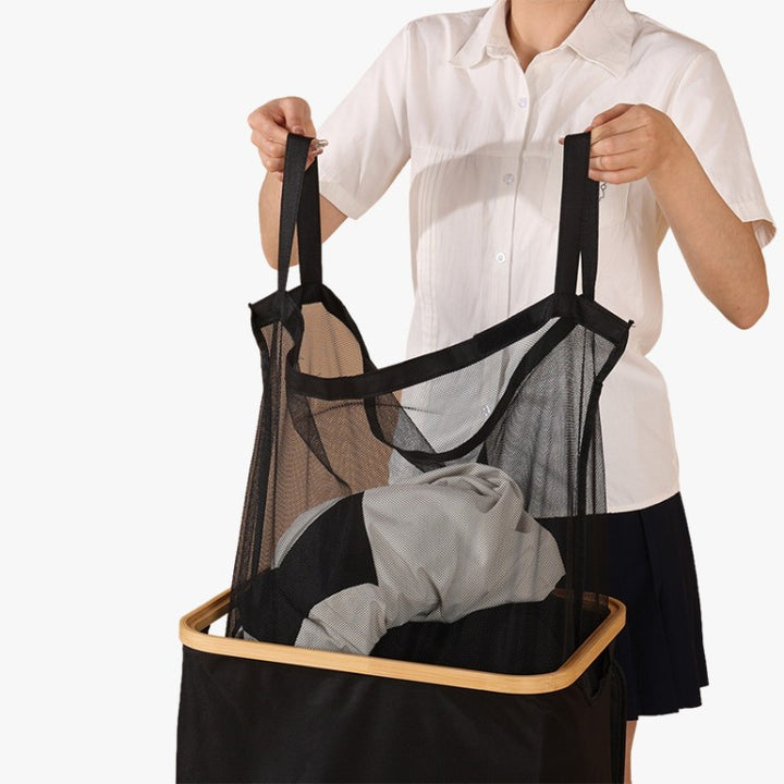 Elegant laundry container with practical lid and carrying system Bowlift
