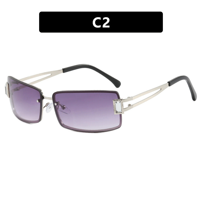 Ladies stylish sunglasses with elegant trapezoidal lenses and filigree metal frame Bowlift
