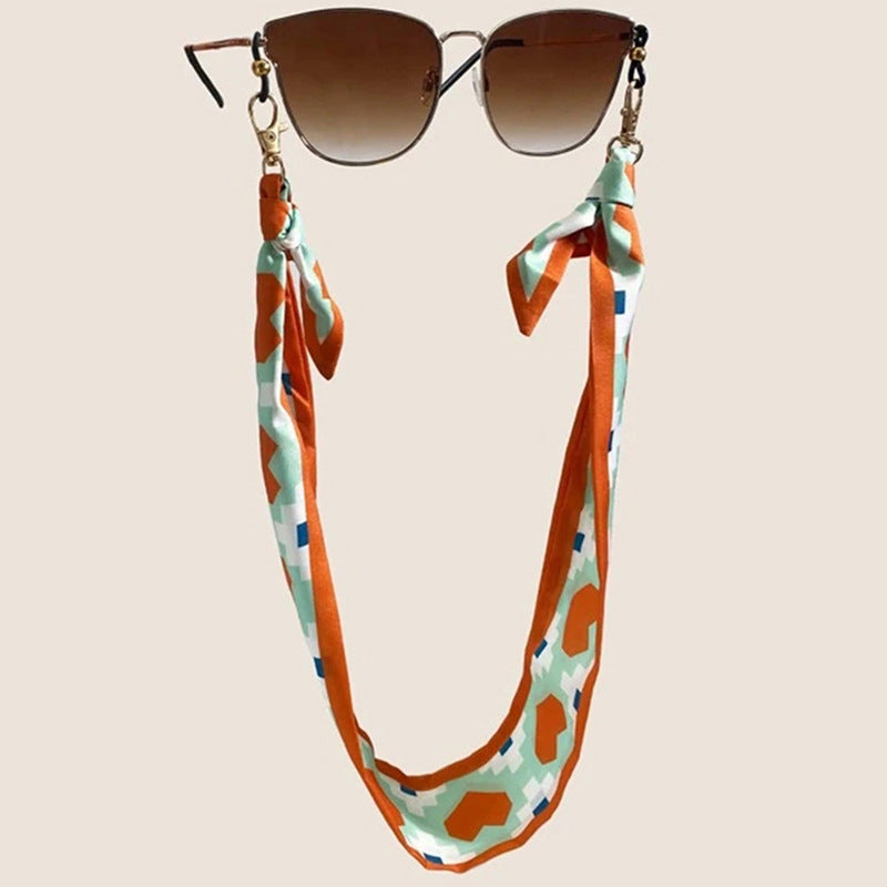 Fashionable fabric mask holder with floral motifs Bowlift