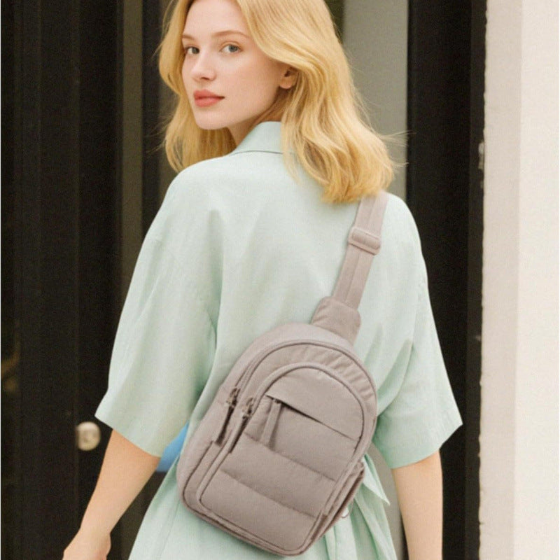 Practical sling bag with multiple compartments Bowlift