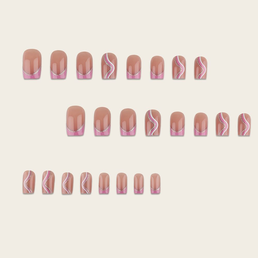 Artificial nails with elegant wave design and glitter accents Bowlift