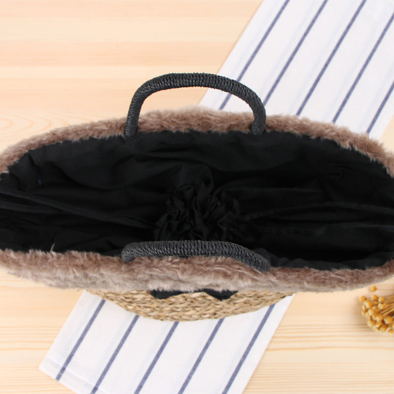Basket bag with fluffy upper edge and decorative bow detail Bowlift